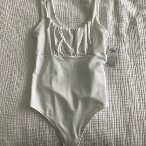 NWT never worn white bodysuit